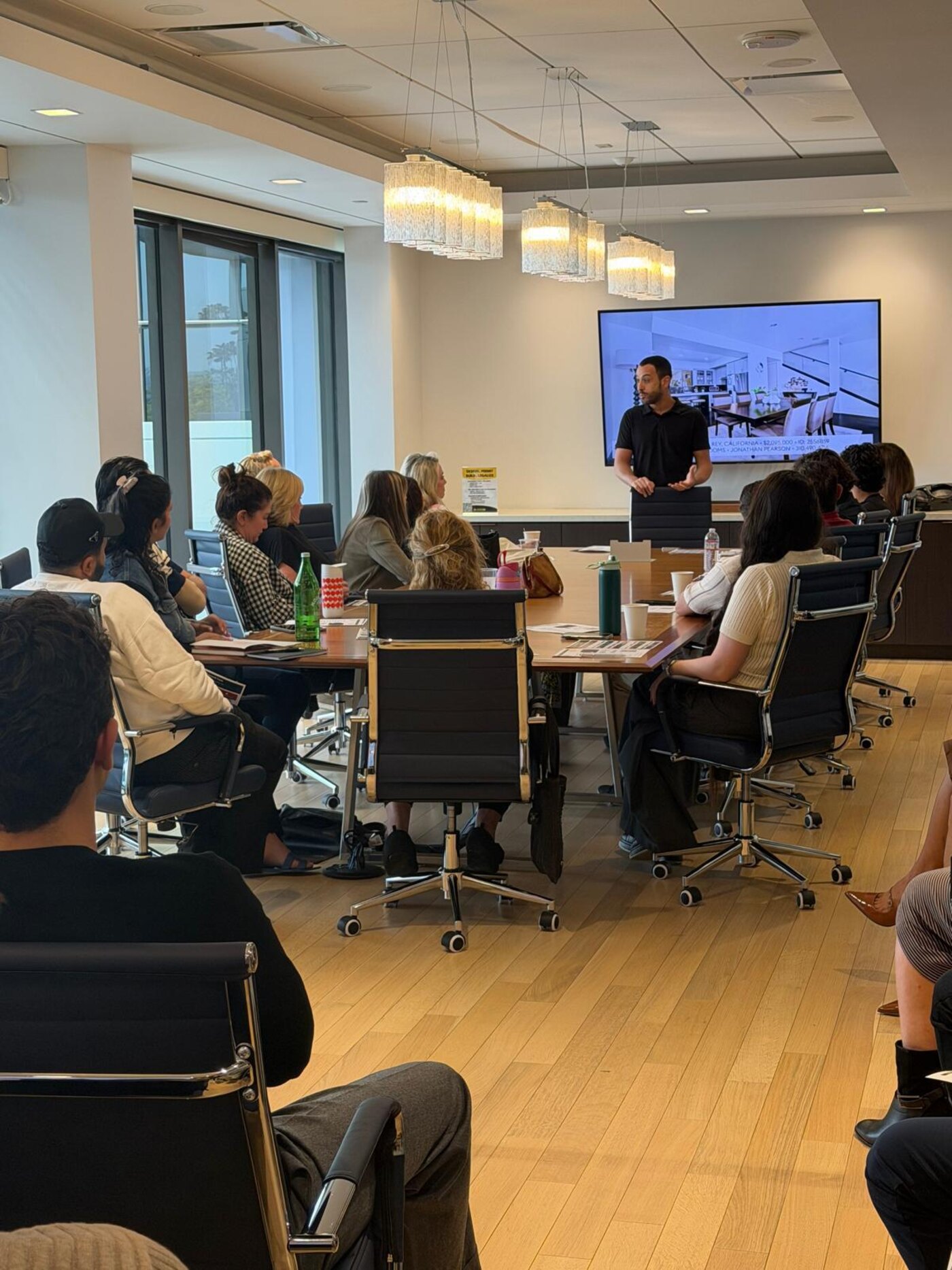 Facade team leading a client presentation on a revitalization project